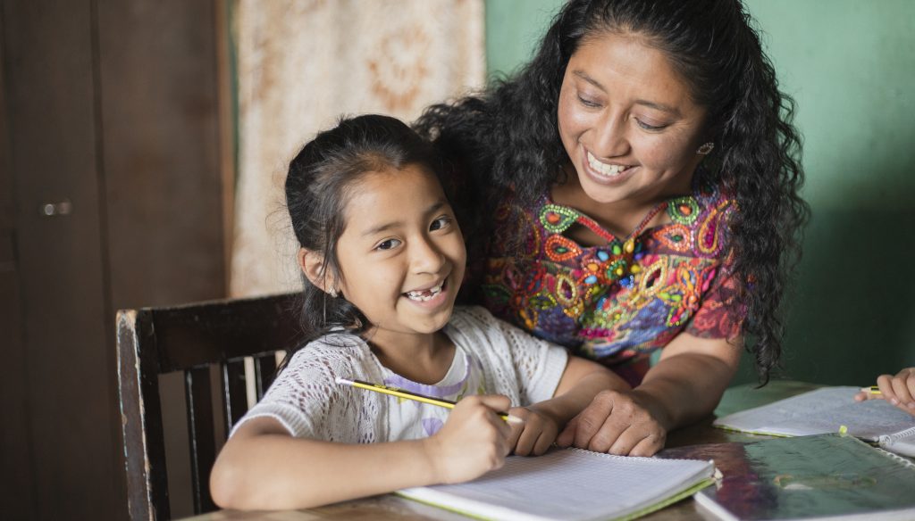 mom and daughter doing homework