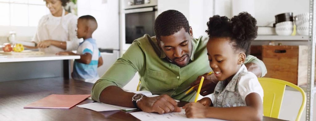 family working on homework